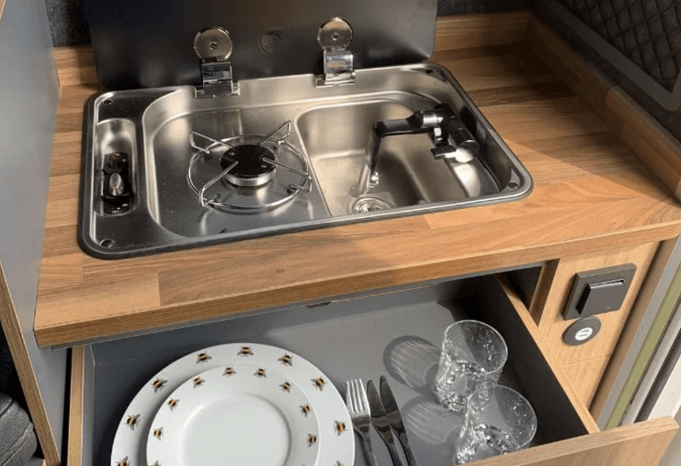 sink, hob and kitchen drawer