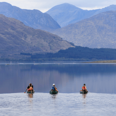 three people kayaking